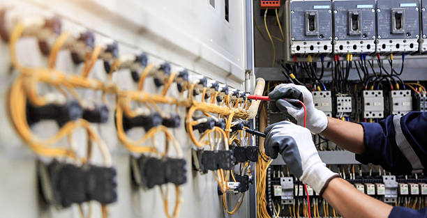 Professional Electrician technician working in Center, TX